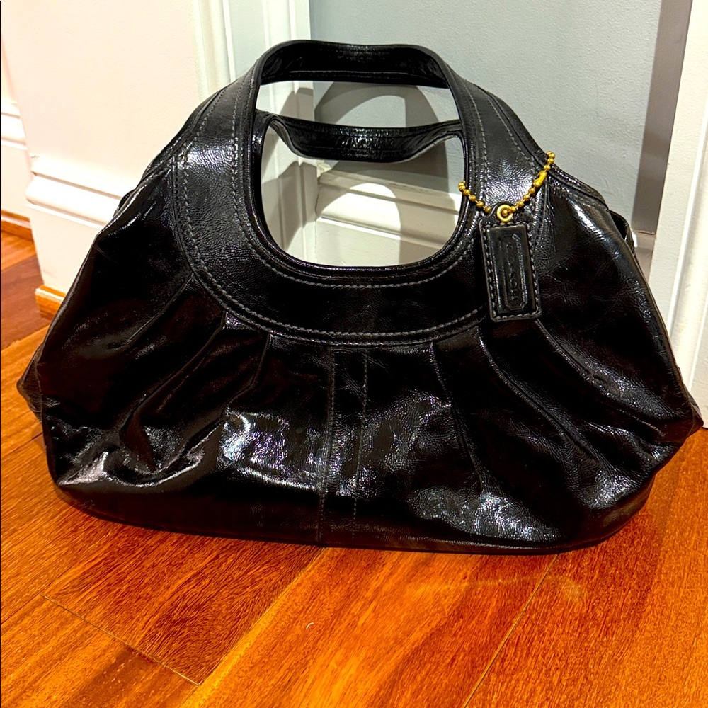 Vintage Coach purse w/dust bag. Black patent leather w/light blue lining.